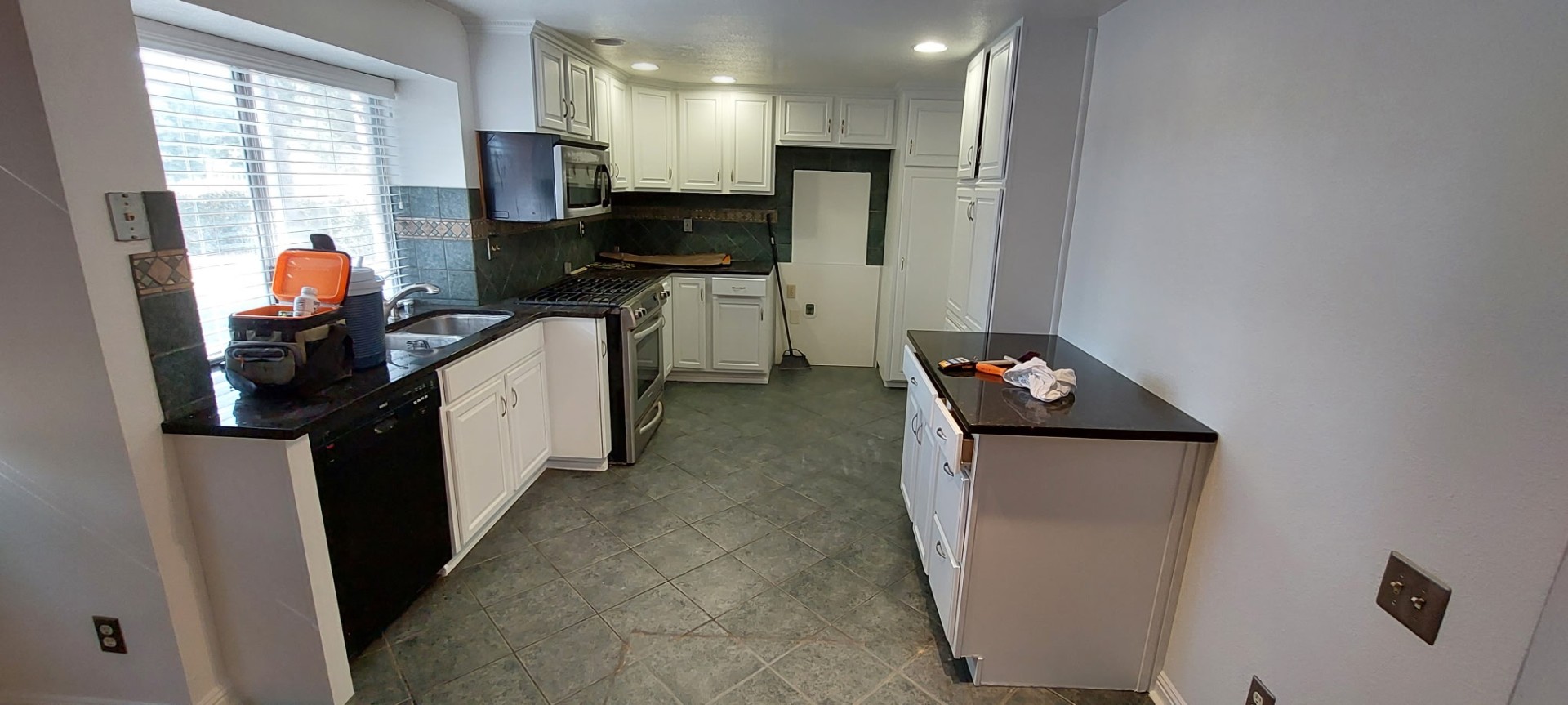 Oak to Bright White Kitchen after painting