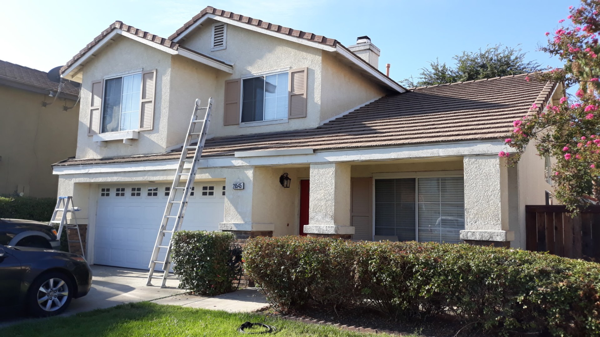 Two-Story Exterior Repaint before painting